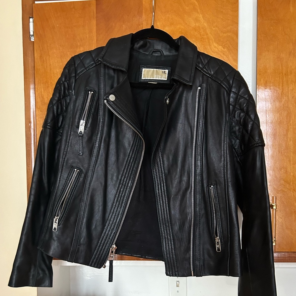 A small Michael Kora Leather Bomber Black Jacket